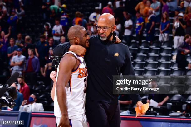 Head Coach Monty Williams of the Phoenix Suns hugs Chris Paul after the game against the Denver Nuggets during Round 2, Game 4 of the 2021 NBA...