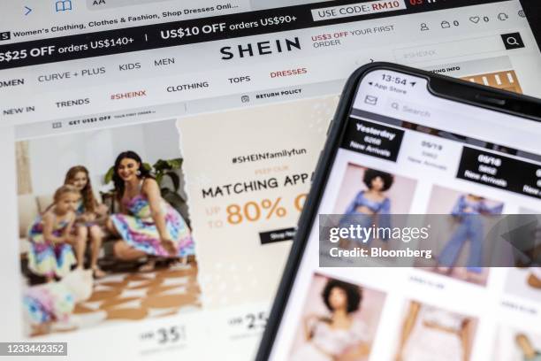 The SheIn application and website arranged on a smartphone and a tablet in Hong Kong, China, on Friday, May 21, 2021. As with so many online...