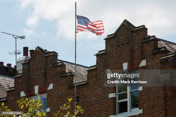 Flag flies between two residential houses close to Windsor Castle on the occasion of the visit following the G7 summit in Cornwall of President Biden...