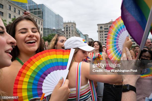 Washington, DC Natalia Feinberg, second from left, and Emma Hopler, center, both 20 and from DC, dance after the march at Freedom Plaza. Capital...