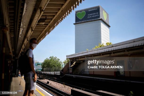 Grenfell Tower is pictured in west London on June 14 four years after a fire in the residential tower block killed 72 people. - Grenfell Tower is the...