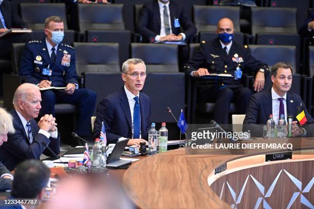 President Joe Biden, NATO Secretary General Jens Stoltenberg and Belgian Prime Minister Alexander De Croo attend a plenary session of a NATO summit...