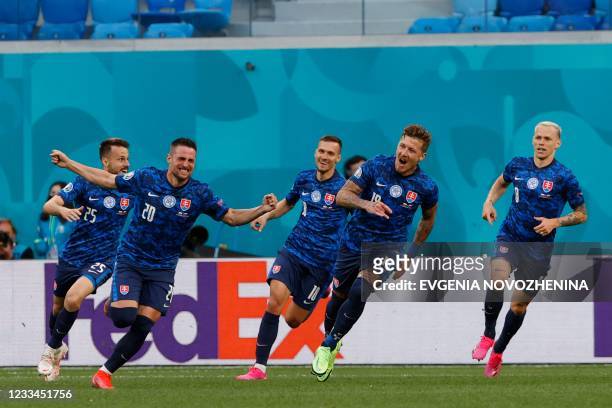 Slovakia's forward Robert Mak celebrates after scoring his team's first goal during the UEFA EURO 2020 Group E football match between Poland and...