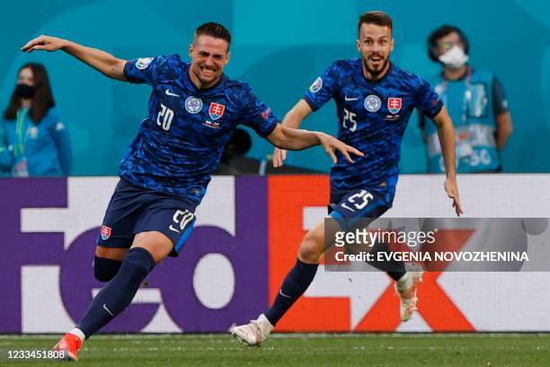 Slovakia's forward Robert Mak celebrates after scoring his team's first goal during the UEFA EURO 2020 Group E football match between Poland and...