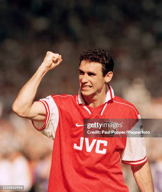 Martin Keown of Arsenal celebrates after the FA Cup Final between Arsenal and Newcastle United at Wembley Stadium on May 16, 1998 in London, England....