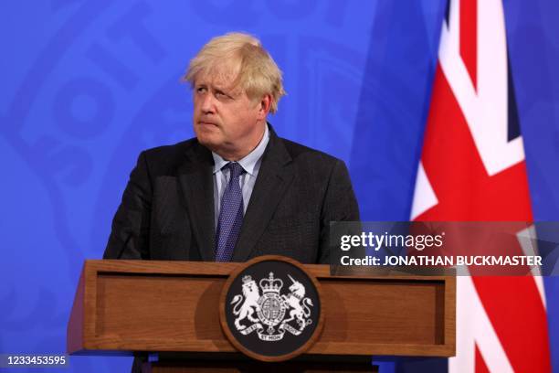 Britain's Prime Minister Boris Johnson gives an update on the coronavirus Covid-19 pandemic during a virtual press conference inside the Downing...