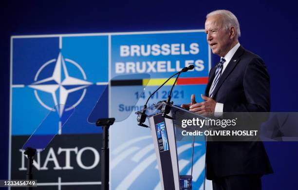 President Joe Biden gives a press conference after the NATO summit at the North Atlantic Treaty Organization headquarters in Brussels, on June 14,...