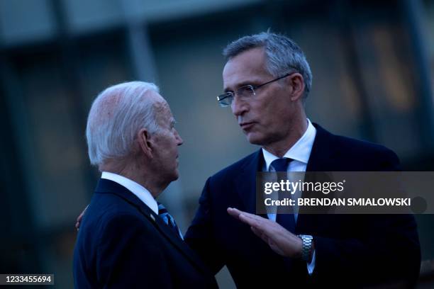 President Joe Biden and NATO Secretary General Jens Stoltenberg talk at a memorial for the September 11 terrorist attacks on the United States after...