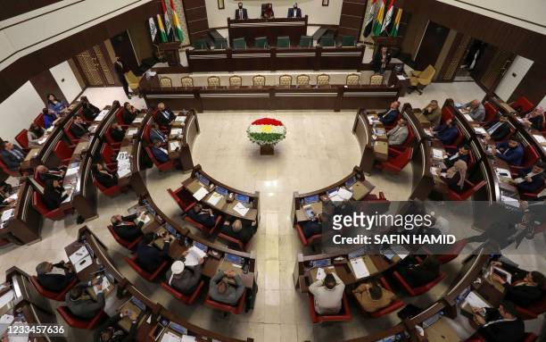 Kurdistan parliament speaker Rewaz Faiq , leads a parliament session in Arbil, the capital of Iraq's northern autonomous Kurdish region, on May 25,...