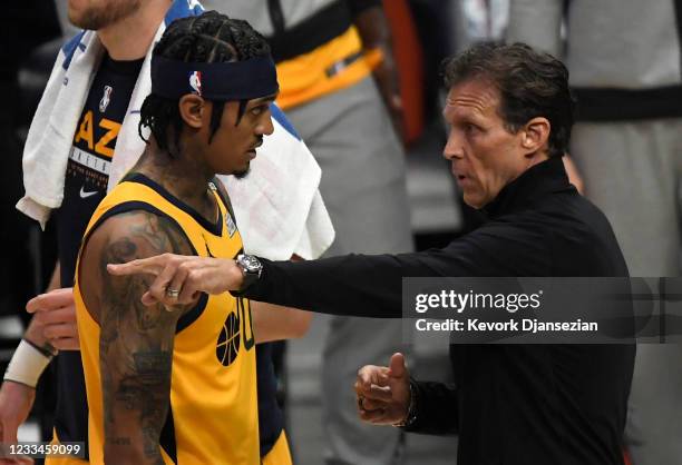 Head coach Quin Snyder of the Utah Jazz talks with Jordan Clarkson during a break in the first half in Game Four of the Western Conference...