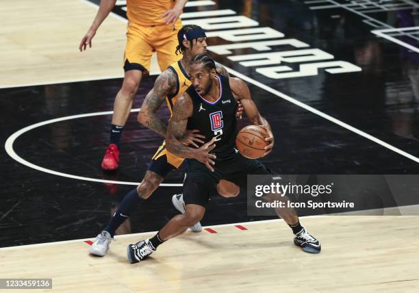 Clippers forward Kawhi Leonard making a move on the lower block during the game 4 of the second round of the Western Conference Playoffs between the...