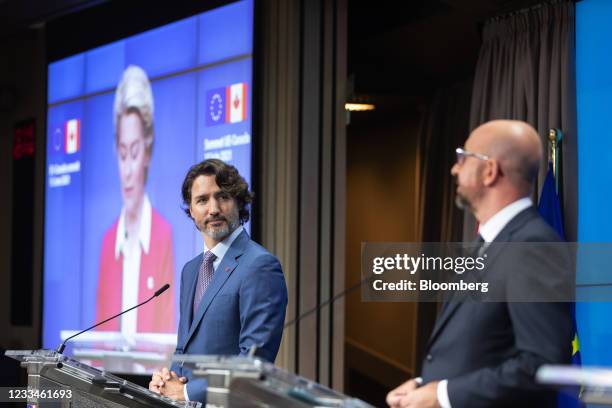 Justin Trudeau, Canada's prime minister, left, beside Charles Michel, president of the European Council, during a news conference following a...