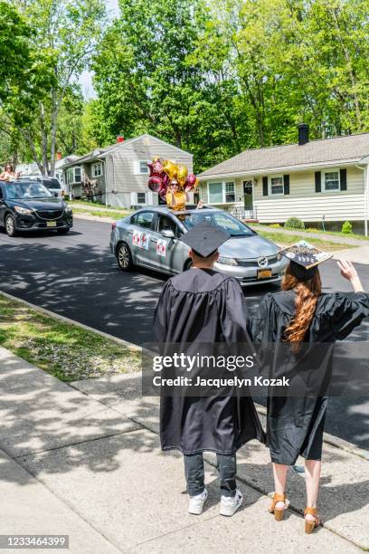 isolation graduation - jacquelyn kozak stock pictures, royalty-free photos & images