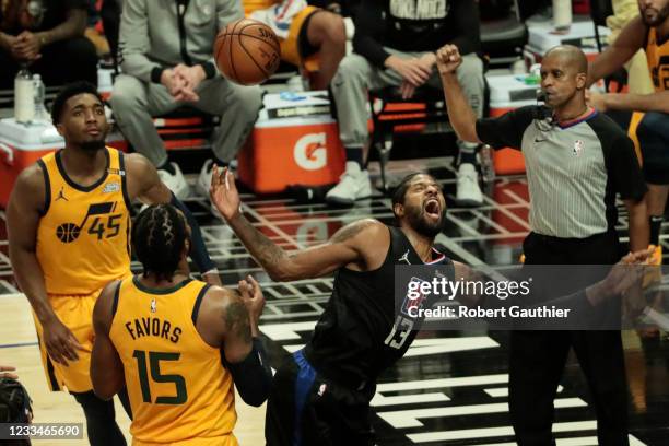 Los Angeles, CA, Monday, June 14, 2021 - LA Clippers guard Paul George celebrates after completing a slam dunk and while being fouled by Utah Jazz...