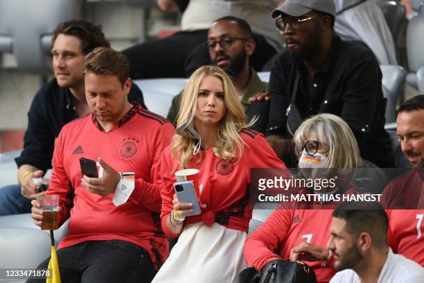 Nina Weiss , the wife of Germany's goalkeeper Manuel Neuer, takes her seat ahead of the UEFA EURO 2020 Group F football match between France and...