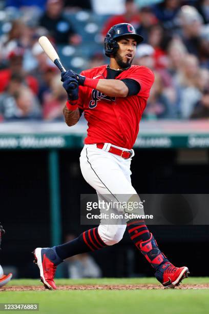 Eddie Rosario of the Cleveland Indians hits a two-run double off Cole Sulser of the Baltimore Orioles during the fourth inning at Progressive Field...