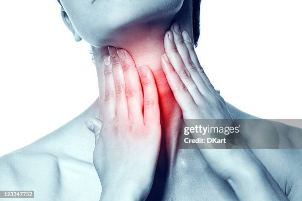 an image of acute pain in the throat of a young women - throat stock pictures, royalty-free photos & images