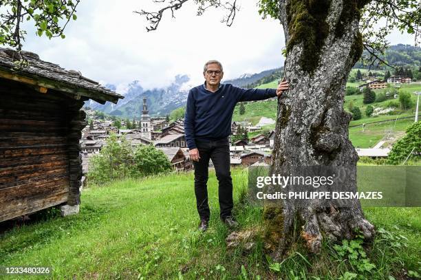 Mayor of La Clusaz, Didier Thevenet, poses on June 7, 2021 in La Clusaz, east-center France, in the Aravis pass. - Works to build a water retention...