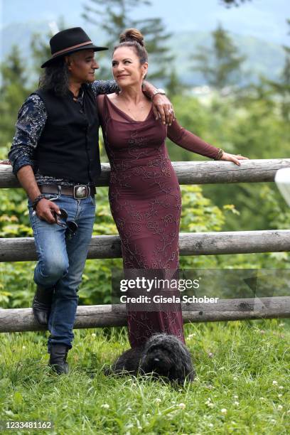 Christine Neubauer and Jose Campos pose with their dog Gismol during the "Watzmann ermittelt" photocall for "Die verkaufte Braut" on June 8, 2021 at...