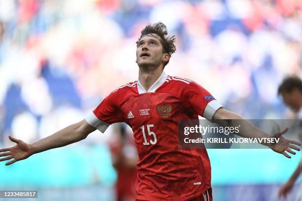 Russia's forward Aleksey Miranchuk celebrates scoring the opening goal during the UEFA EURO 2020 Group B football match between Finland and Russia at...