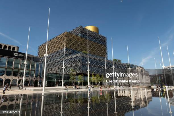 Local people interacting with the new fountains in Centenary Square on 15th June 2021 in Birmingham, United Kingdom. The £16m redevelopment of...