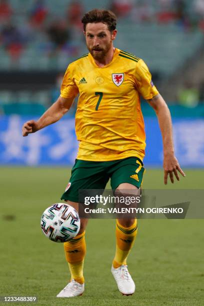 Wales' midfielder Joe Allen controls the ball during the UEFA EURO 2020 Group A football match between Turkey and Wales at the Olympic Stadium in...