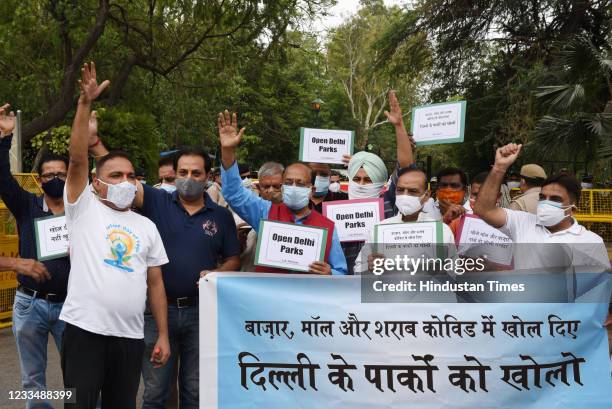 Leader Vijay Goel with supporters protests against the Delhi Govt outside Lodhi Garden to demand reopening of parks, on June 16, 2021 in New Delhi,...