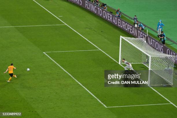 Wales' forward Gareth Bale kicks to miss a penalty kick past Turkey's goalkeeper Ugurcan Cakir during the UEFA EURO 2020 Group A football match...