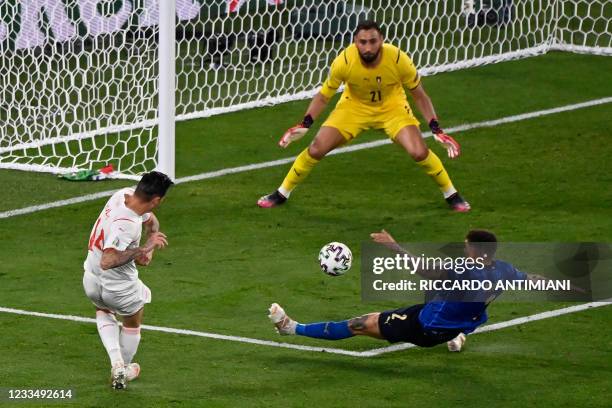 Switzerland's midfielder Steven Zuber attempts on goal during the UEFA EURO 2020 Group A football match between Italy and Switzerland at the Olympic...