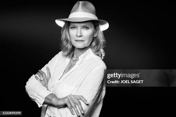 Austrian model, actress and former muse of photographer German-Australian photographer Helmut Newton, Sylvia Gobbel poses during a photo session in...