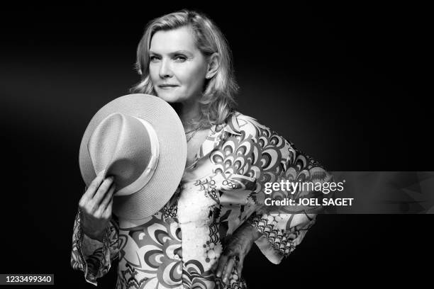 Austrian model, actress and former muse of photographer German-Australian photographer Helmut Newton, Sylvia Gobbel poses during a photo session in...