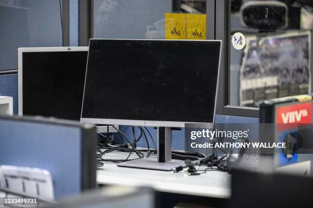 Monitor is seen detached from its desktop computer at the Apple Daily political desk, after they were taken away as evidence from the local paper's...