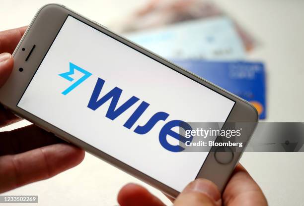 The Wise digital payments provider company logo on a smartphone arranged in Danbury, U.K., on Thursday, June 17, 2021. Digital-payments provider Wise...