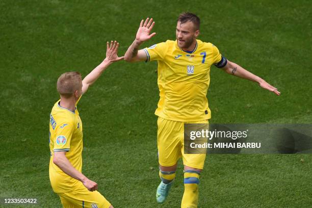 Ukraine's forward Andriy Yarmolenko celebrates after scoring the opening goal during the UEFA EURO 2020 Group C football match between Ukraine and...