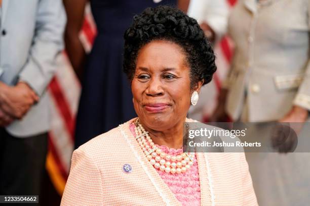 Rep. Sheila Jackson Lee waits for Speaker of the House Nancy Pelosi to arrive for a bill enrollment signing ceremony for the Juneteenth National...