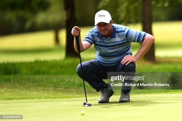 Greig Hutcheon of Torphins GC lines up a putt during Day Three of the PGA Professional Championship at Blairgowrie Golf Club on June 17, 2021 in...