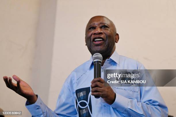 Former Ivorian president Laurent Gbagbo gestures as he speaks to supporters at the Ivorian Popular Front offices in Abidjan on June 17, 2021. Ivory...