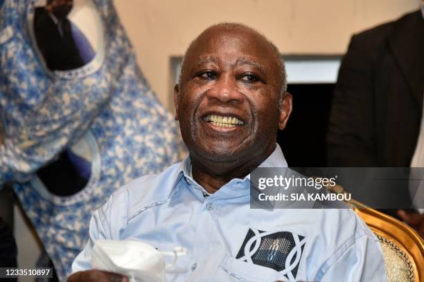 Former Ivorian president Laurent Gbagbo smiles at the Ivorian Popular Front offices in Abidjan on June 17, 2021. - Ivory Coast's former president...