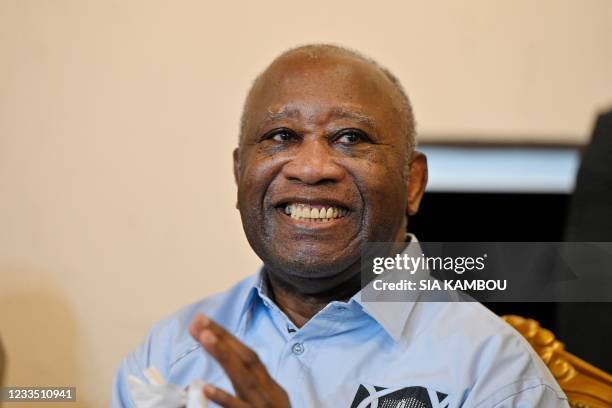 Former Ivorian president Laurent Gbagbo smiles at the Ivorian Popular Front offices in Abidjan on June 17, 2021. - Ivory Coast's former president...