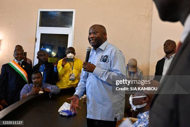 Former Ivorian president Laurent Gbagbo speaks to supporters at the Ivorian Popular Front offices in Abidjan on June 17, 2021. - Ivory Coast's former...