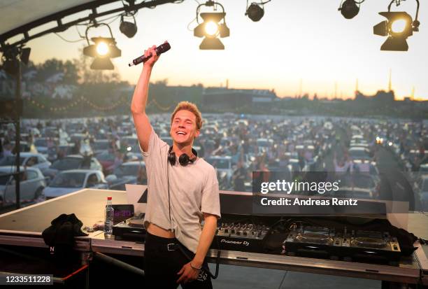 German DJ Felix Jaehn performs on stage at BonnLive drive-in concert at Am Westwerk during the Coronavirus crisis on May 29, 2020 in Bonn, Germany....