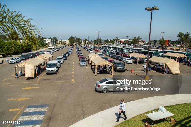 Citizens attend a vaccination center to receive the U.S. Donated Johnson & Johnson vaccine against Covid-19 at Universidad de Baja California on June...