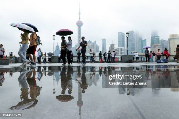 Tourists visit the Bund waterfront area as China celebrates the 100th anniversary of the founding of the Communist Party of China on June 17, 2021 in...