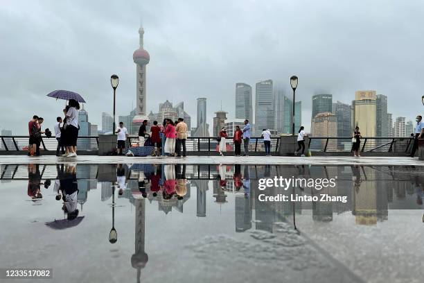 Tourists visit the Bund waterfront area as China celebrates the 100th anniversary of the founding of the Communist Party of China on June 17, 2021 in...