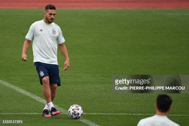Spain's midfielder Koke controls a ball during their MD-1 training session at Las Rozas near Madrid on June 18, 2021 on the eve of their UEFA EURO...