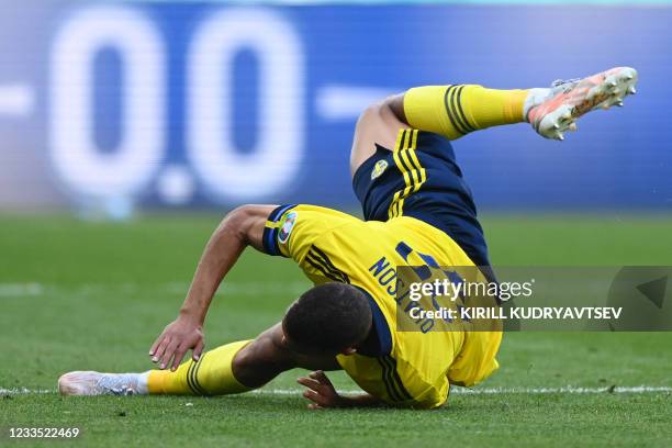 Sweden's midfielder Robin Quaison is fouled leading to a penalty during the UEFA EURO 2020 Group E football match between Sweden and Slovakia at...