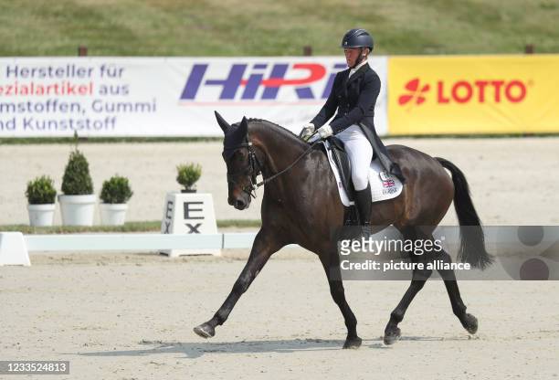June 2021, Lower Saxony, Luhmühlen: Equestrian sport: German Championships, Eventing. The British event rider Emilie Chandler rides Gortfadda Diamond...