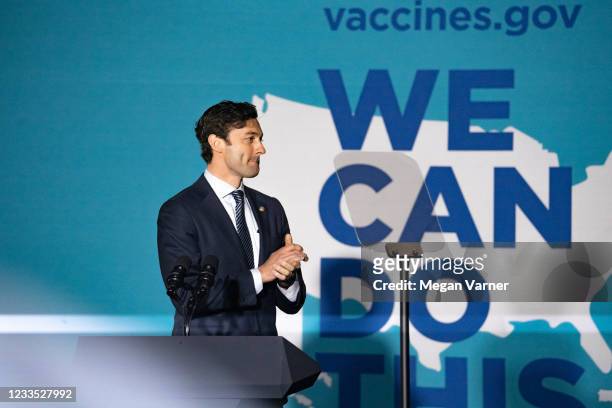 Sen. Jon Ossoff speaks with community members and students at Clark Atlanta University during a vaccine event lead by Vice President Kamala Harris on...