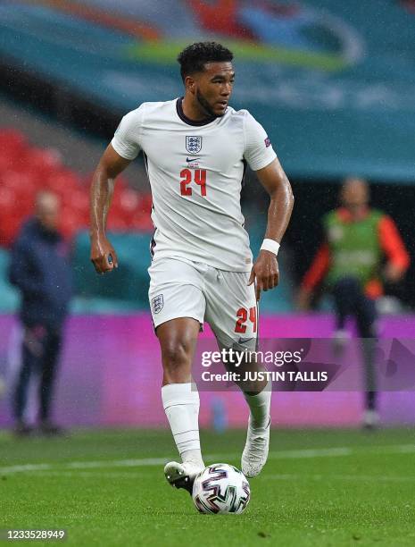 England's defender Reece James controls the ball during the UEFA EURO 2020 Group D football match between England and Scotland at Wembley Stadium in...