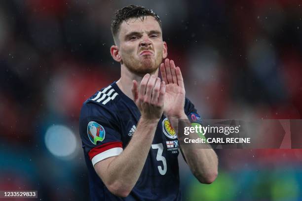 Scotland's defender Andrew Robertson reacts at the end of the UEFA EURO 2020 Group D football match between England and Scotland at Wembley Stadium...